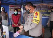 Kapolres Palu Bagikan Parsel Pos Pam Ketupat dan Posko Covid-19